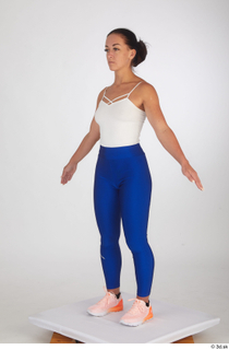  Zuzu Sweet blue leggings orange sneakers sports standing white top whole body 0010.jpg